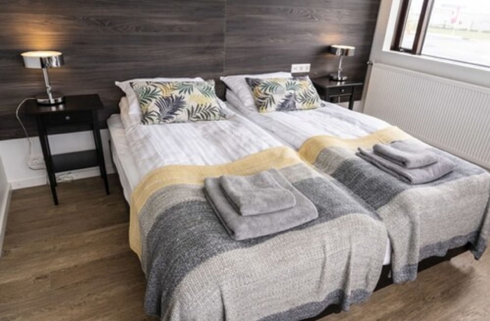 Imagen de la habitación del Hotel Black Beach Guesthouse. Foto 11