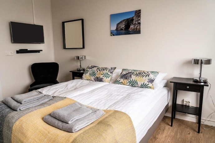 Imagen de la habitación del Hotel Black Beach Guesthouse. Foto 13