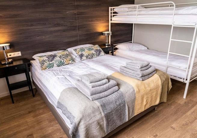 Imagen de la habitación del Hotel Black Beach Guesthouse. Foto 15