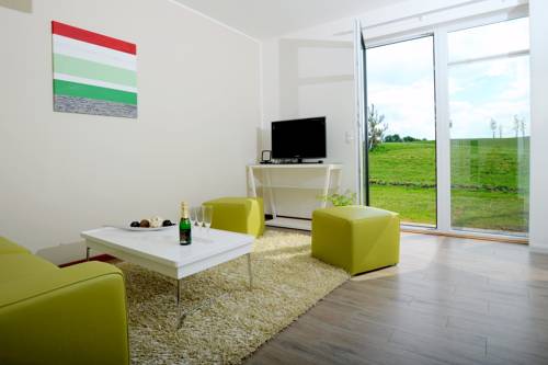 Imagen de la habitación del Hotel Black Bridge Apartment. Foto 7