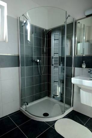 Imagen de la habitación del Hotel Black Bridge Apartment. Foto 9