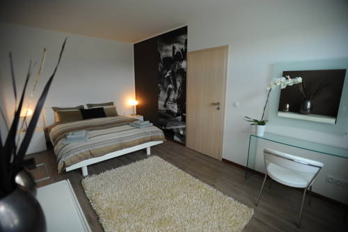 Imagen de la habitación del Hotel Black Bridge Apartment. Foto 13