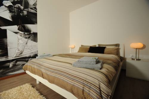 Imagen de la habitación del Hotel Black Bridge Apartment. Foto 14