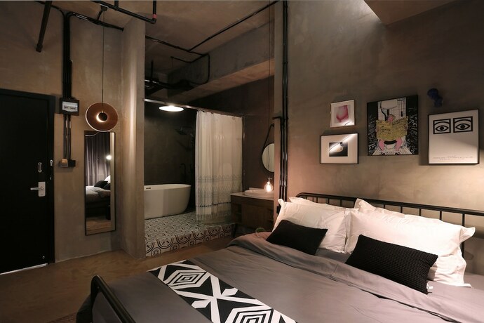 Imagen de la habitación del Hotel Black Gold Factory Boutique Design. Foto 22