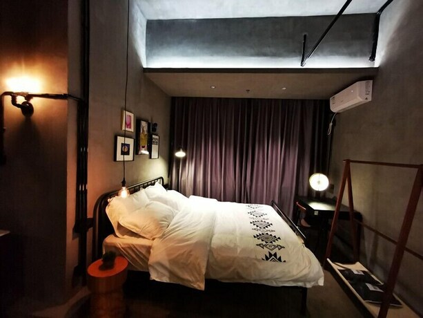 Imagen de la habitación del Hotel Black Gold Factory Boutique Design. Foto 23