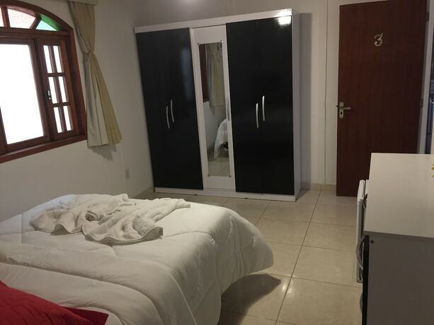 Imagen de la habitación del Hotel Black Point Beach Club. Foto 14