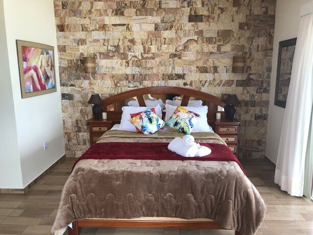 Imagen de la habitación del Hotel Black Point Beach Club. Foto 15
