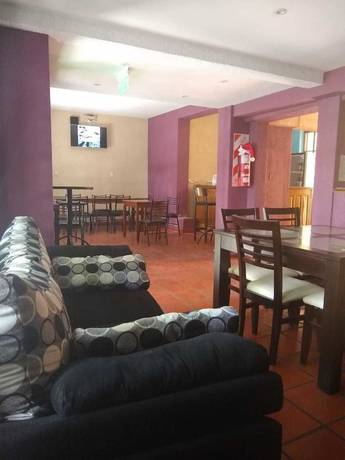 Imagen del bar/restaurante del Hotel Black Sheep International Hostel. Foto 6