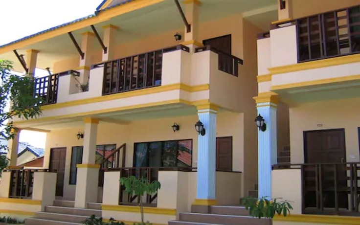 Imagen de la habitación del Hotel Black and White Bungalows. Foto 15