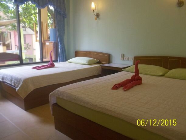 Imagen de la habitación del Hotel Black and White Bungalows. Foto 16