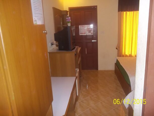 Imagen de la habitación del Hotel Black and White Bungalows. Foto 19