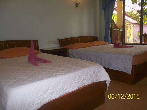 Imagen de la habitación del Hotel Black and White Bungalows. Foto 20