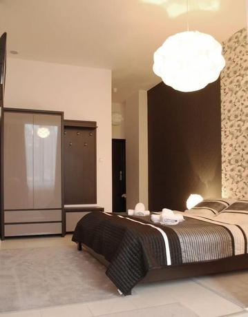 Imagen de la habitación del Hotel Black and White. Foto 16