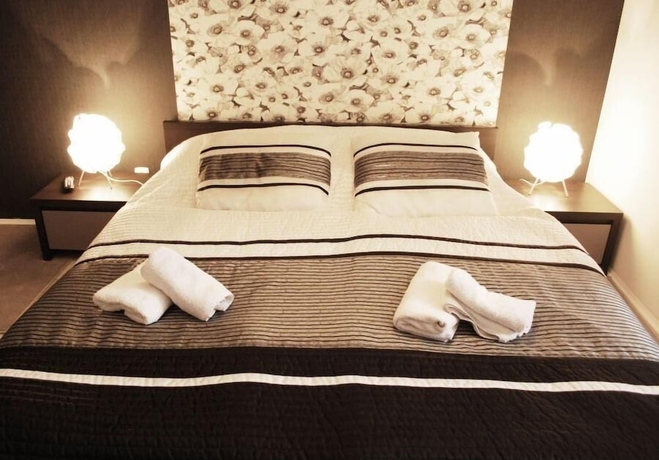 Imagen de la habitación del Hotel Black and White. Foto 17