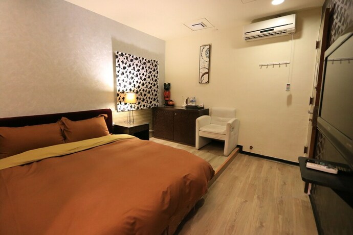 Imagen de la habitación del Hotel Black and White Inn. Foto 25