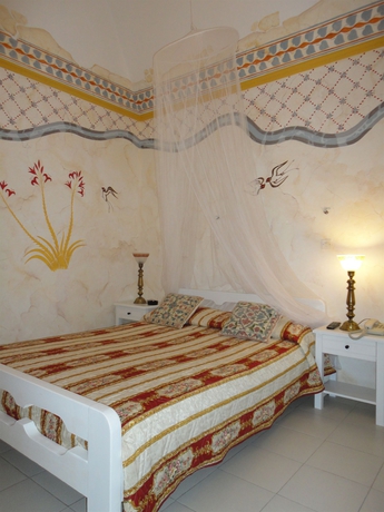 Imagen de la habitación del Hotel Blacksandy Beach. Foto 4