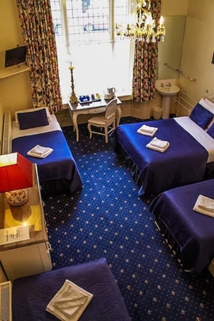 Imagen de la habitación del Hotel Blades. Foto 6