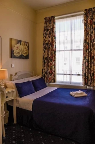 Imagen de la habitación del Hotel Blades. Foto 13