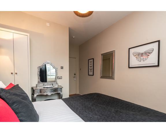 Imagen de la habitación del Hotel Blanch House. Foto 4
