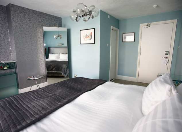 Imagen de la habitación del Hotel Blanch House. Foto 16