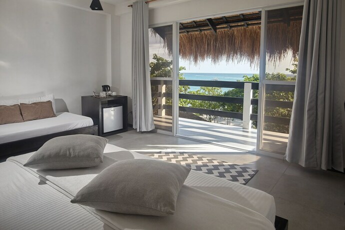 Imagen de la habitación del Hotel Blanco Beach Resort. Foto 20
