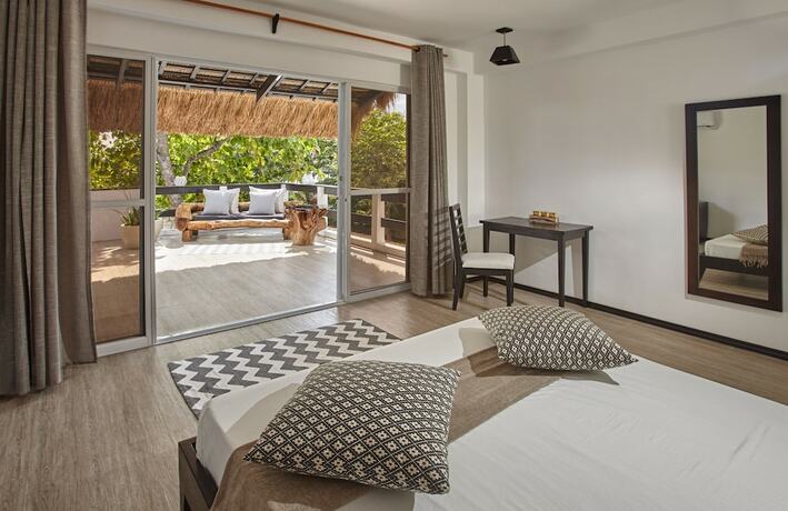 Imagen de la habitación del Hotel Blanco Beach Resort. Foto 34