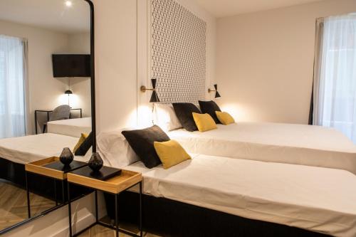 Imagen de la habitación del Hotel Blanq Comedias. Foto 8
