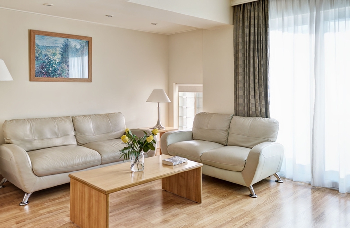 Imagen de la habitación del Hotel Blazer Suites. Foto 5