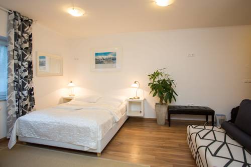 Imagen de la habitación del Hotel Bled Apartments. Foto 15