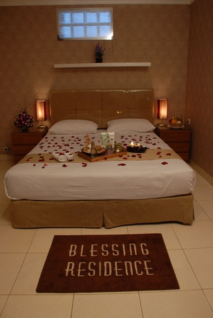 Imagen de la habitación del Hotel Blessing Residence. Foto 6