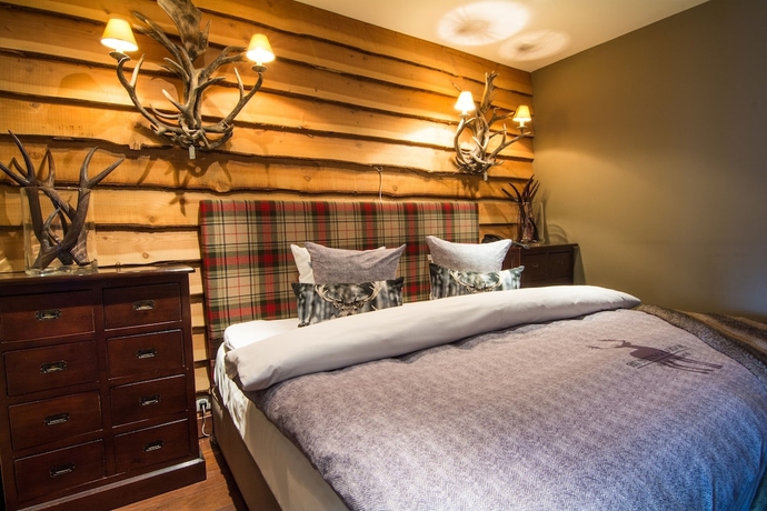 Imagen de la habitación del Hotel Bliss Boutique. Foto 13