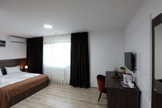 Imagen de la habitación del Hotel Bliss Inn Tunari. Foto 7