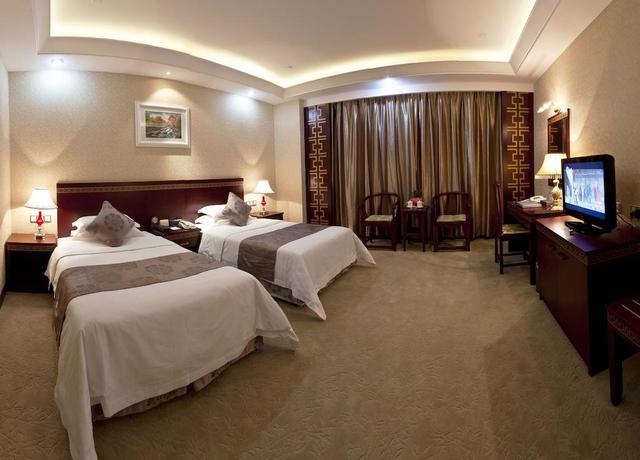 Imagen de la habitación del Hotel Bliss International. Foto 12