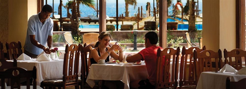 Imagen del bar/restaurante del Hotel Bliss Nada Beach Resort. Foto 4