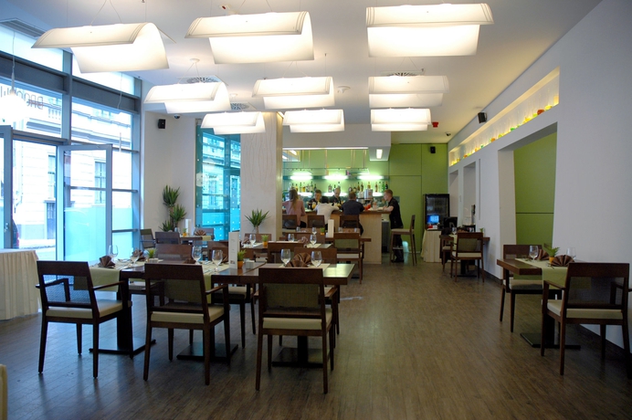 Imagen del bar/restaurante del Hotel Bliss Residence and Spa. Foto 2