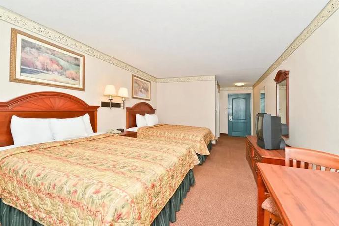 Imagen de la habitación del Hotel BlissPoint Inn and Suites. Foto 4