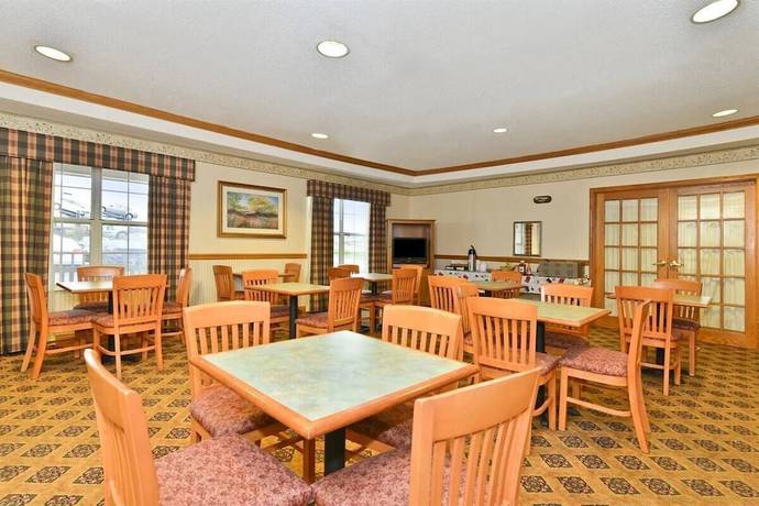 Imagen del bar/restaurante del Hotel BlissPoint Inn and Suites. Foto 2