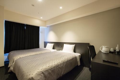 Imagen de la habitación del Hotel Bloemen North-hanazono. Foto 6