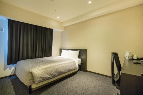 Imagen de la habitación del Hotel Bloemen North-hanazono. Foto 9