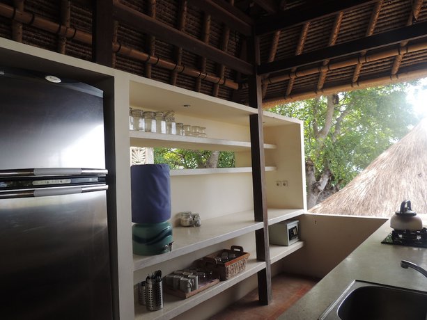 Imagen de la habitación del Hotel Bloo Lagoon Eco Village. Foto 16