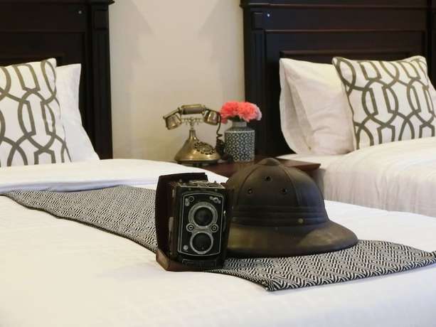Imagen de la habitación del Hotel Bloom Boutique and Cafe. Foto 17