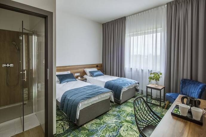 Imagen de la habitación del Hotel Bloom. Foto 14