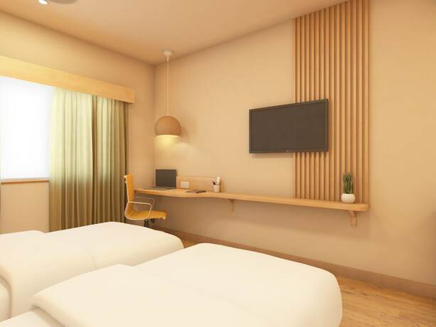Imagen de la habitación del Hotel Bloom - Karol Bagh. Foto 14
