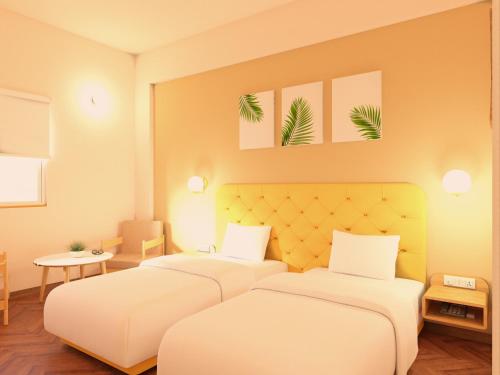 Imagen de la habitación del Hotel Bloom Katra. Foto 18