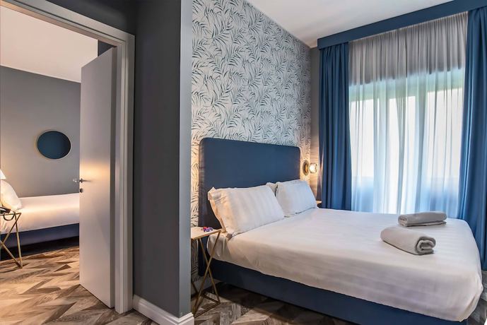 Imagen de la habitación del Hotel Bloom Rome. Foto 5