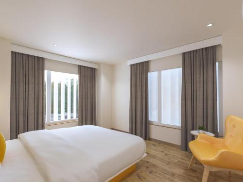 Imagen general del Hotel Bloom SG Highway. Foto 15