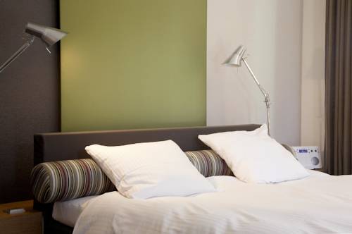 Imagen de la habitación del Hotel Blooming. Foto 16