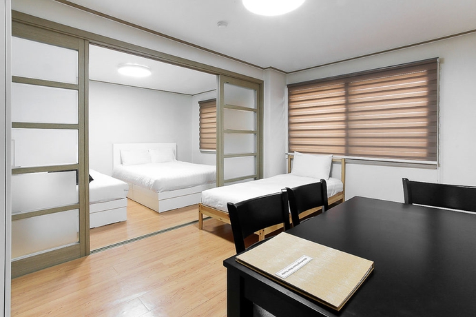 Imagen de la habitación del Hotel Blooming House Residence. Foto 5
