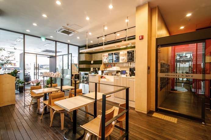 Imagen del bar/restaurante del Hotel Blooming House Residence. Foto 2
