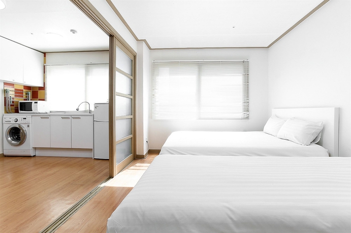 Imagen de la habitación del Hotel Blooming House Residence. Foto 9